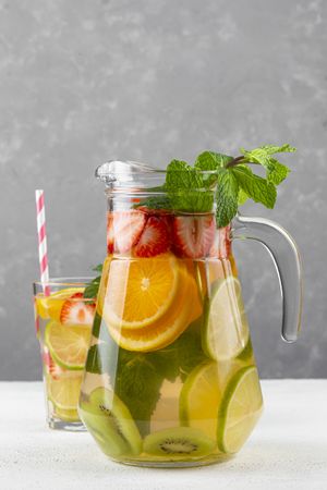 Water flavored with fresh summer fruit.
