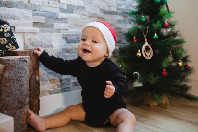 Excited baby with Christmas gift