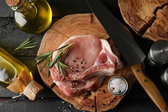 Composition with raw meat and ingredients. Cooking steak concept