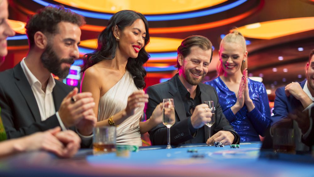 Portrait of a Rich Man Winning at a Gambling Table Game in a Fancy Modern Casino.