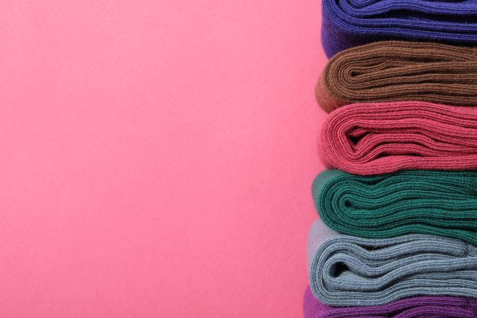Casual clothes and wearing concept - socks, clothes for foot