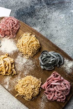 Cooking concept with different homemade pasta