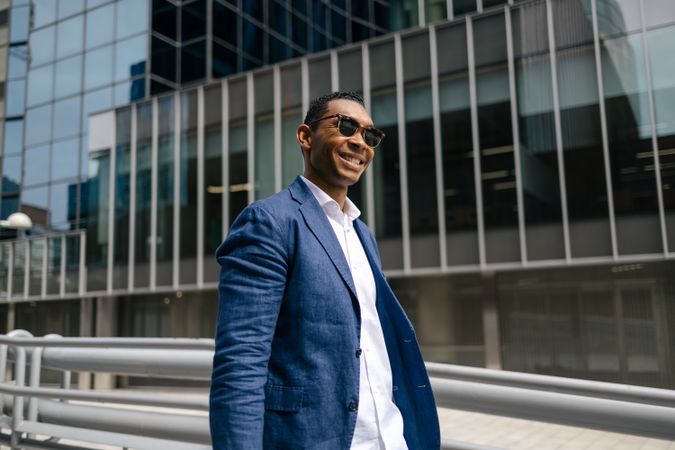 Man walking confident through financial area