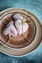 Table setting with pink felt hearts