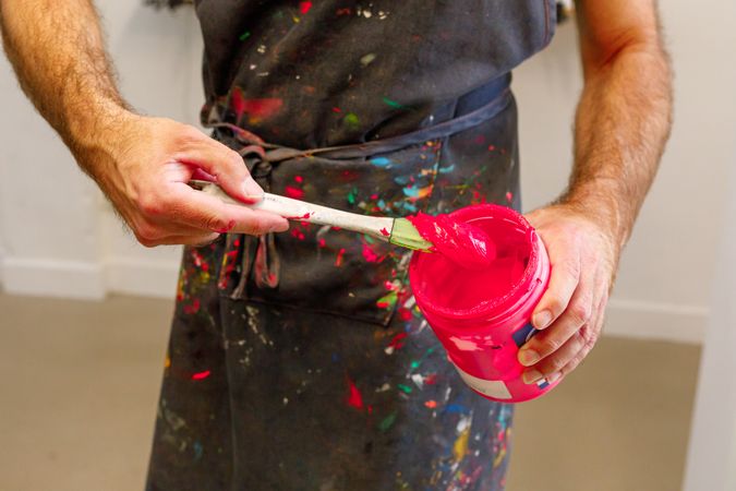 male artist preparing paints
