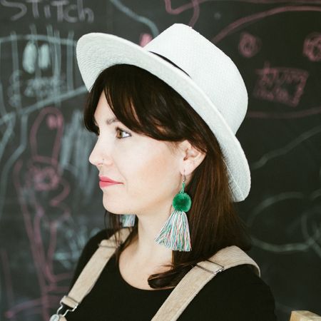 Portrait of model with handmade earrings