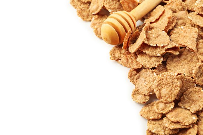Chocolate muesli and dipper isolated on plain background
