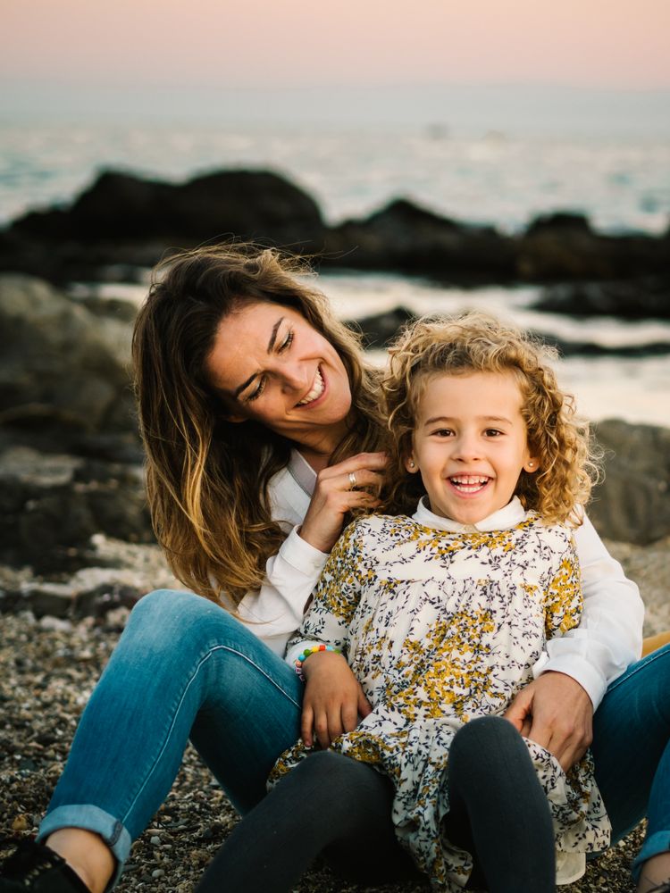 Mother with her daughter at beach