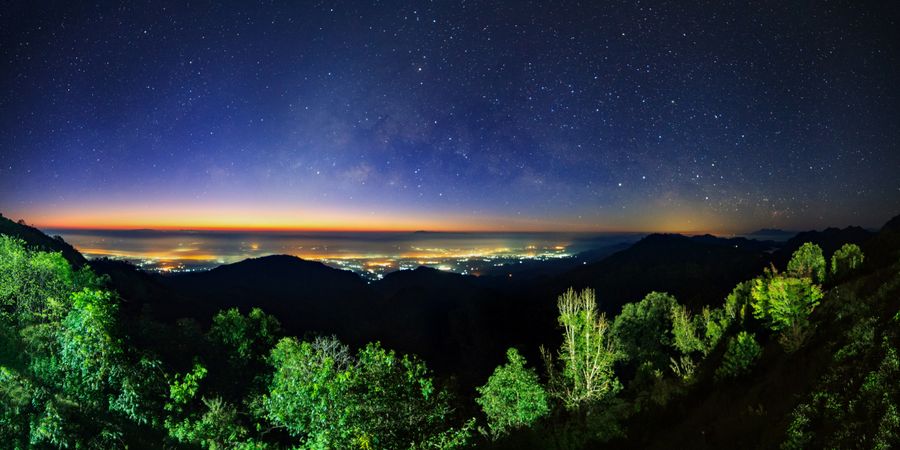 Starry night sky at Monson viewpoint Doi AngKhang and milky way galaxy with stars and space dust in the universe