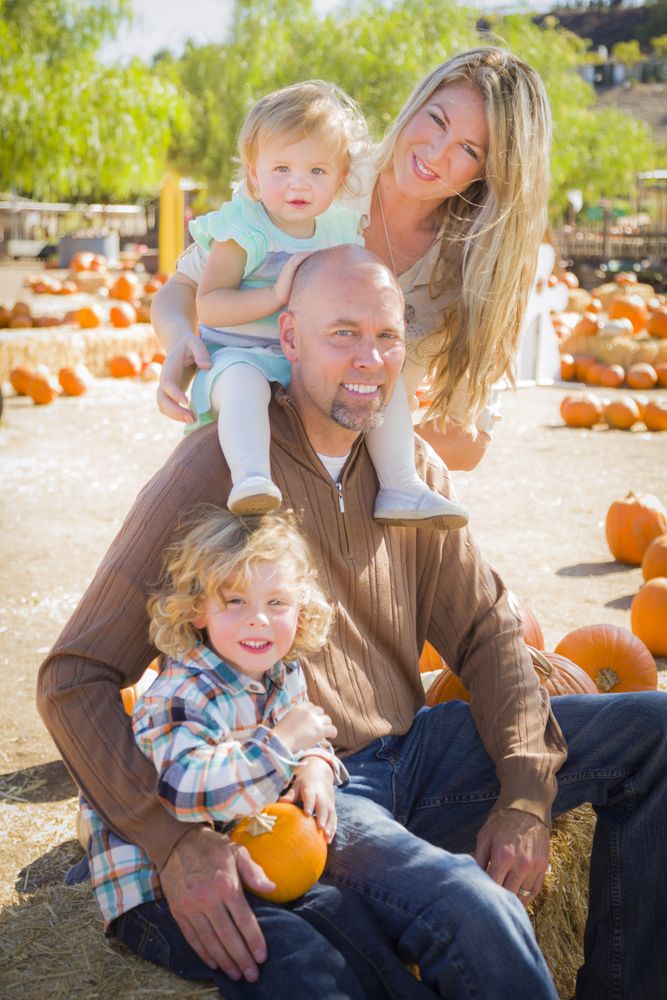 Autumn Family Portrait at the Pumpkin Patch.