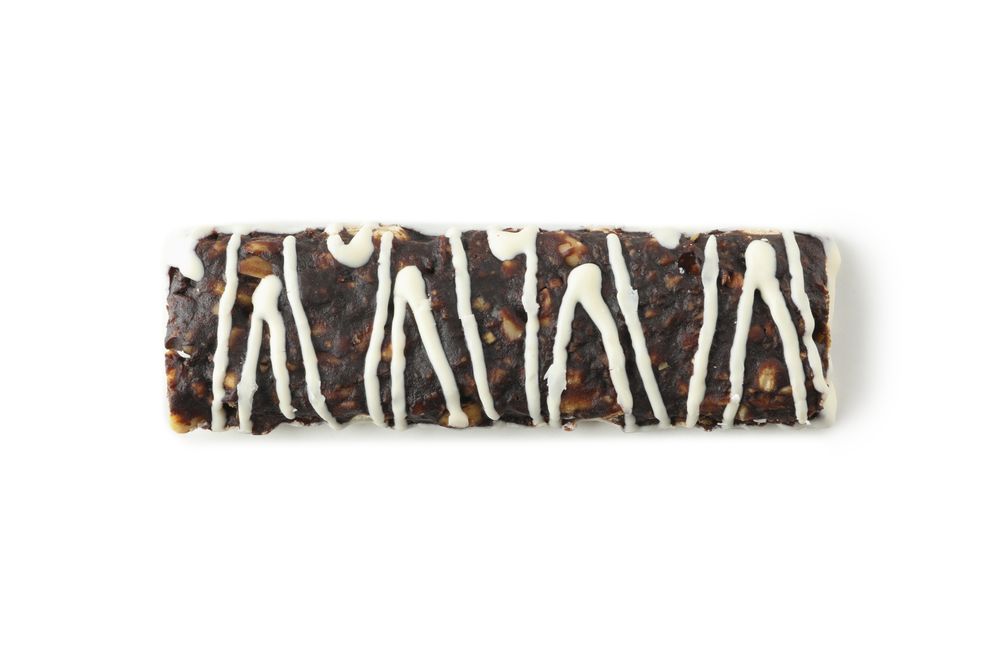 Tasty granola bar isolated on blank background