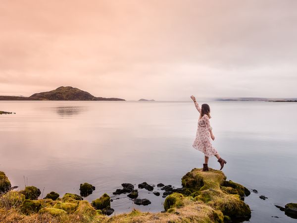 Woman posing at lake
