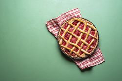 Raspberries cake with a lattice crust. Pie top view