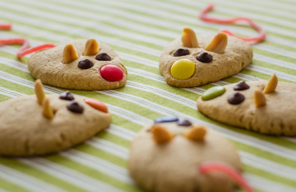 Cookies with mouse shaped and red licorice tail