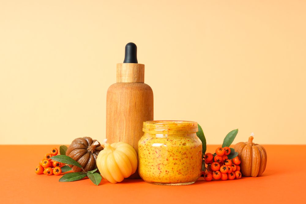 Skin care and face care concept - pumpkin cosmetic