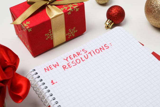 Concept of New Year Resolutions list, new year goals, close up