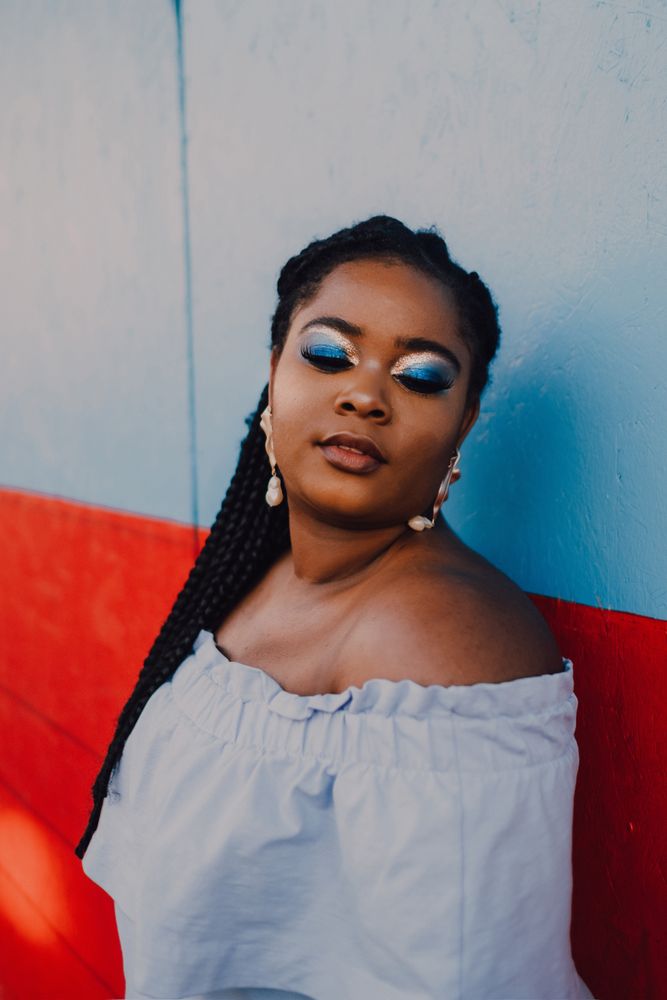 Dreamy trendy Black woman with closed eyes
