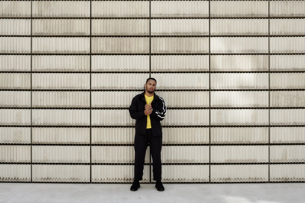 Black male near concrete blocks