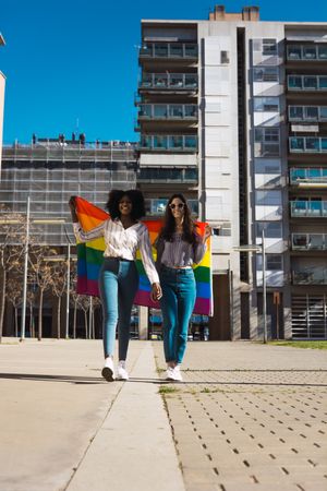 Women couple with LGBT flag