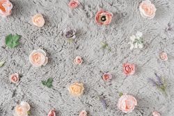 Pattern of flowers on grey carpet