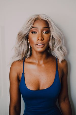 Charming Black woman in blue trendy dress