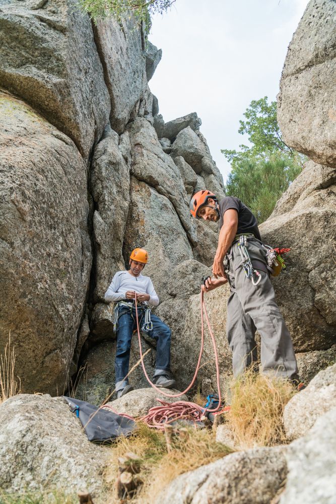 Climbers is preparing their ropes to start climbing