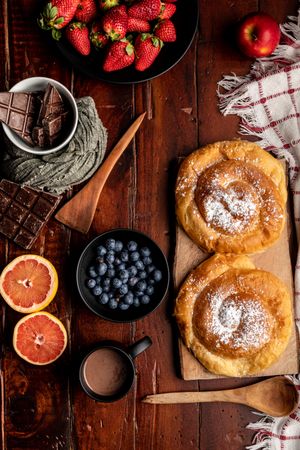 Breakfast food and drink on wooden table