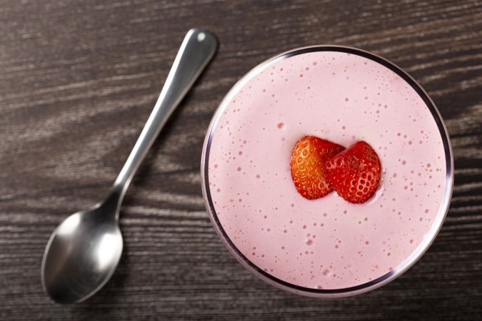 Delicious strawberry mousse in glass goblet.