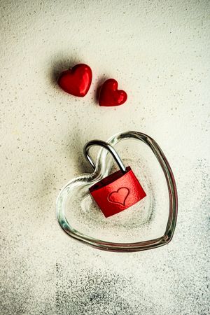 Heart shaped dish with red padlock and heart decorations