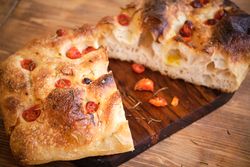 Photo of focaccia cut in half