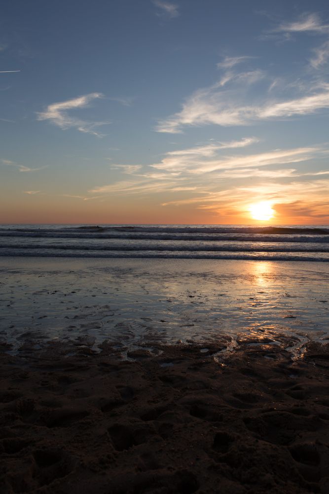 Picturesque view of sandy beach at sunset