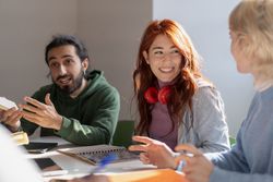 University students sharing ideas in a collaborative space
