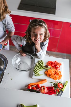Portrait of little girl in kitchen