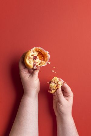 Woman hands holding a muffin