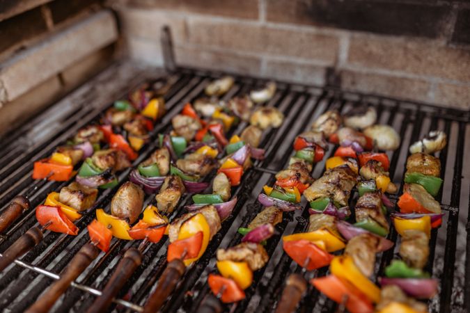 cooking skewers in barbecue