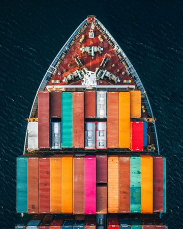 Aerial view of multicolored shipping containers on ship
