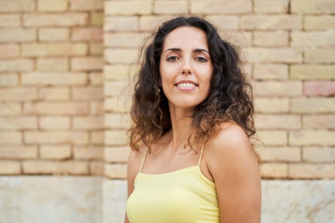 portrait of a smiling young woman looking at the camera