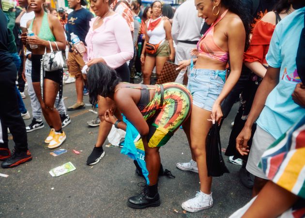 London, England, United Kingdom - August 28, 2022: Two women dancing at Notting Hill Carnival