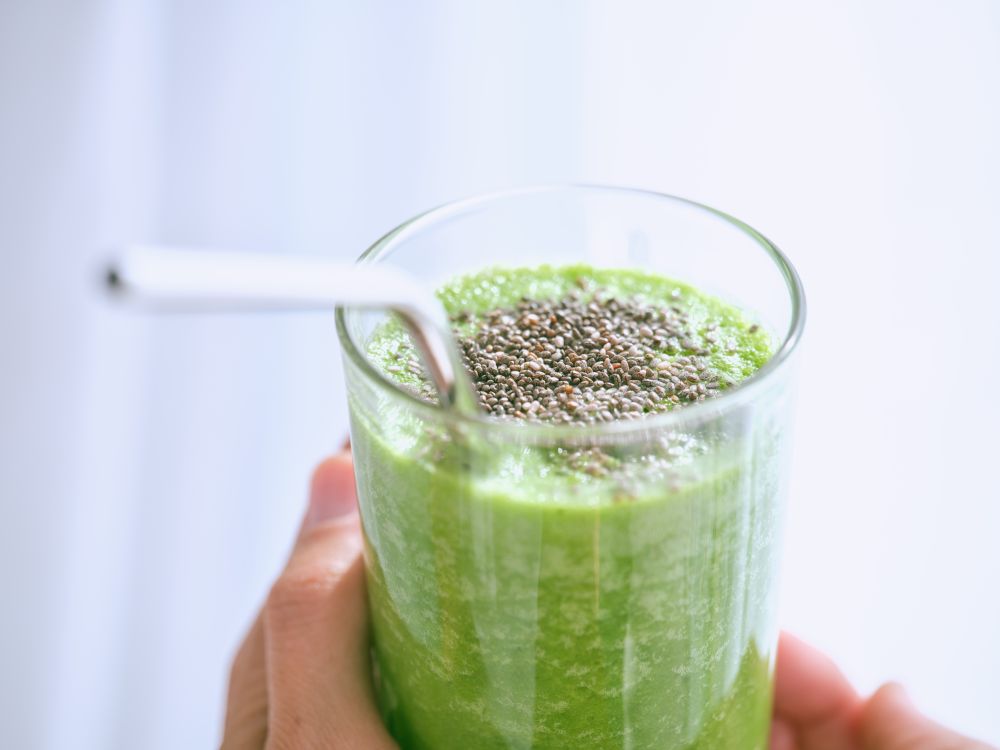 Anonymous person with smoothie with chia