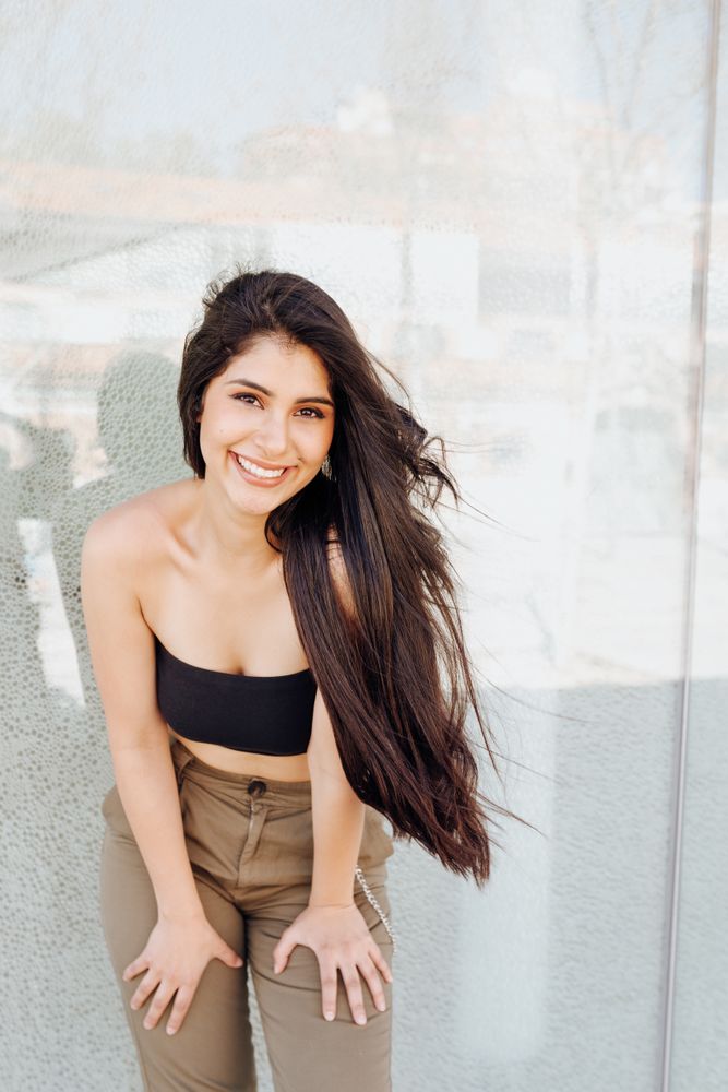female model standing near wall
