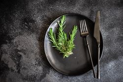 Table setting with rosemary sprigs