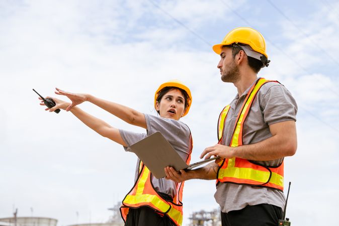 Engineer worker checking project at petrochemical factory or refinery oil plant industrial.