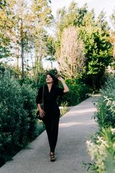 Cheerful female walking in park