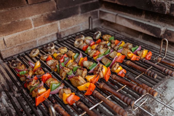 cooking skewers in barbecue