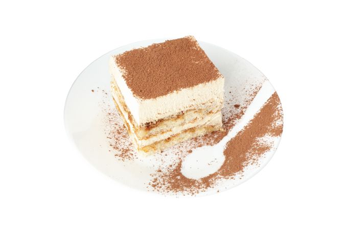 Sweet tiramisu isolated on blank background. Tasty dessert