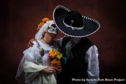 Mexican bride and groom with sugar skull face paint 5kwa35