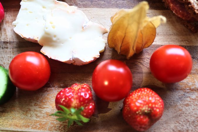 Close view on a healthy german breakfast with sandwiches, tomatoes and cucumbers