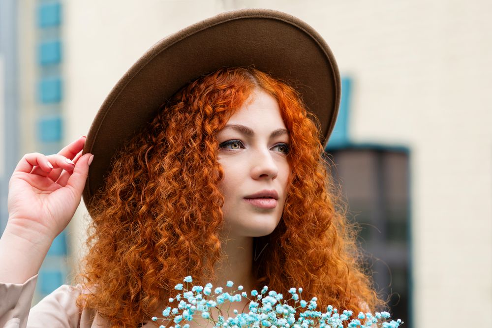 Street portrait of woman in hat