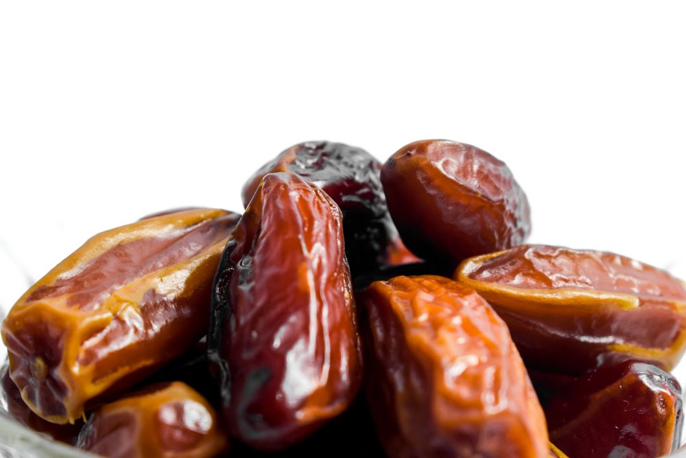 Close up fruits dates on isolated blank background