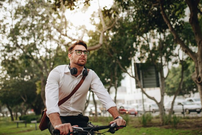 Health conscious man commuting to office on a bike